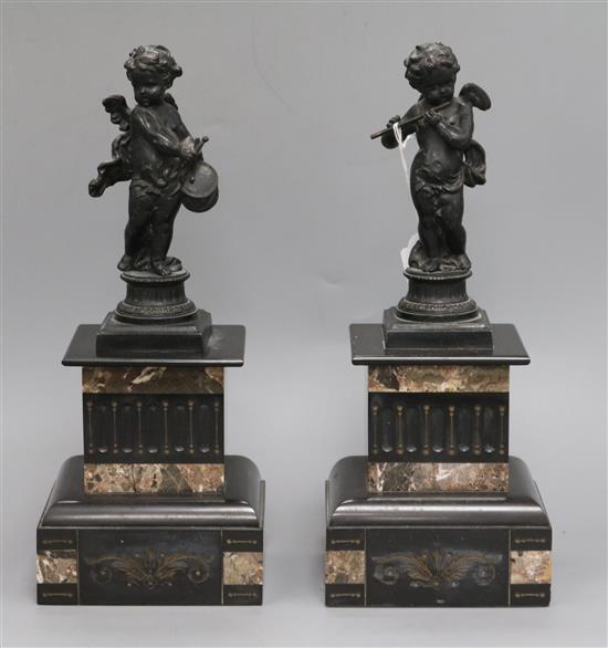 A pair of spelter garnitures height 32cm